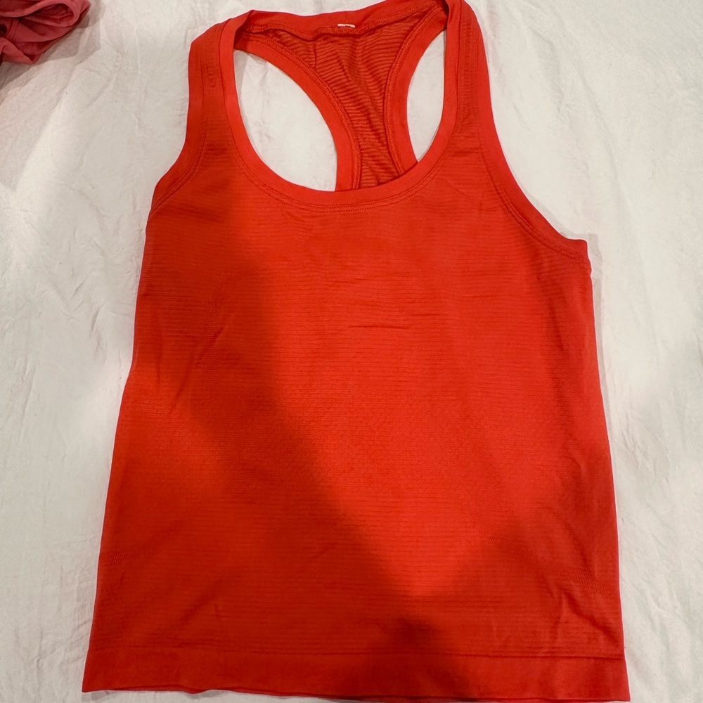 Red lululemon swiftly tech tank top